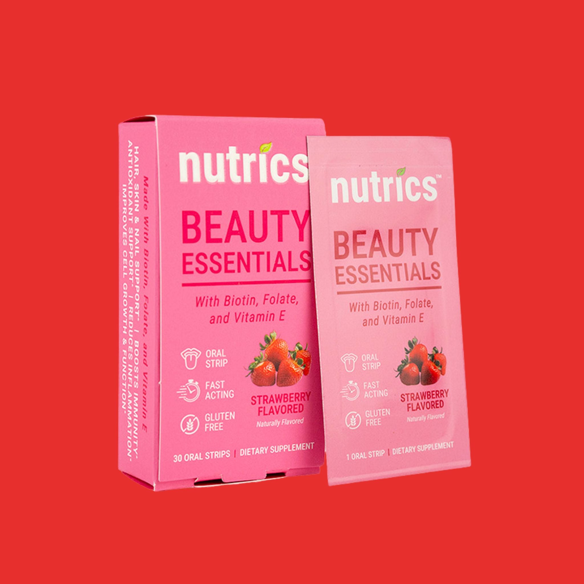 Two pink boxes of Nutrics Beauty Essentials on a red background
